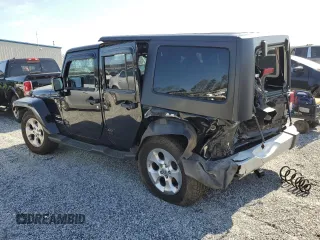 2014 Jeep Wrangler Unlimited Sahara with VIN 1C4BJWEG1EL102203, listed as a Copart auction lot 50360705 with 89,831 mi miles and Salvage Title. Bid and sale history available at carsss.com. Image 2.