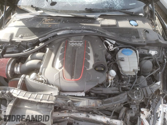 2014 Audi S6 Prestige z VIN WAUF2AFC6EN101479, wystawiony jako Copart lot #77700524 z przebiegiem 104 652 mil mil oraz Szkody całkowita. Historia ofert i sprzedaży dostępna na DreamBid. Obrazek 11.
