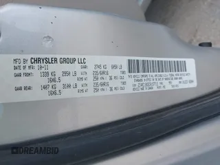 2012 Chrysler Town & Country Touring with VIN 2C4RC1BG5CR157712, listed as a IAAI auction lot 41942939 with 244,799 mi miles. Bid and sale history available at carsss.com. Image 9.