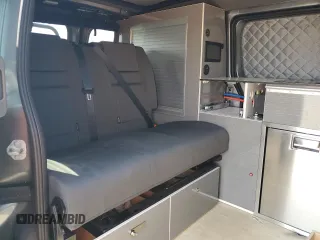 2021 Nissan NV200 SV z VIN 3N6CM0KN7MK705335, wystawiony jako Copart lot #60527375 z przebiegiem 26 095 mil mil oraz Szkoda całkowita • Salvage title. Historia ofert i sprzedaży dostępna na DreamBid. Obrazek 11.