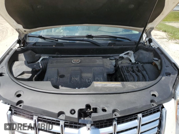 2014 Cadillac SRX Luxury Collection z VIN 3GYFNBE30ES685072, wystawiony jako Copart lot #58122705 z przebiegiem 128 013 mil mil oraz Szkoda całkowita • Salvage title. Historia ofert i sprzedaży dostępna na DreamBid. Obrazek 12.