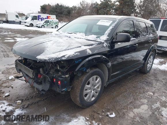 2014 Dodge Journey American Value Pkg with VIN 3C4PDCAB4ET283985, listed as a IAAI auction lot 41617089 with 155,860 mi miles. Bid and sale history available at carsss.com. Image 2.
