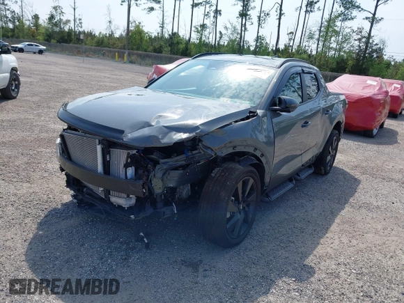 2023 Hyundai Santa Cruz Night Edition z VIN 5NTJCDAF0PH054192, wystawiony jako IAAI lot #40734723 z przebiegiem 9 700 mil mil oraz . Historia ofert i sprzedaży dostępna na DreamBid. Obrazek 2.