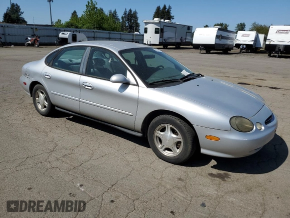 1999 Ford Taurus SE with VIN 1FAFP53U9XG171645, listed as a Copart auction lot 53187385 with 180,644 mi miles and Clean title. Bid and sale history available at DreamBid. Image 4.