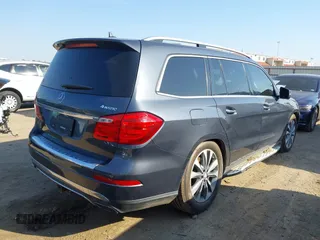 2016 Mercedes-Benz GL with VIN 4JGDF6EE0GA703783, listed as a IAAI auction lot 41696515 with 146,679 mi miles. Bid and sale history available at carsss.com. Image 4.