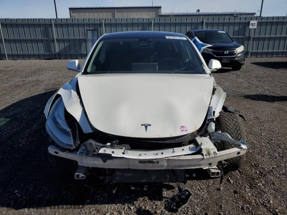 2020 Tesla Model 3 Standard Range Plus z VIN 5YJ3E1EA9LF718478, wystawiony jako Copart lot #52707145 z przebiegiem 111 068 mil mil oraz Szkoda całkowita • Salvage title. Historia ofert i sprzedaży dostępna na DreamBid. Obrazek 5.