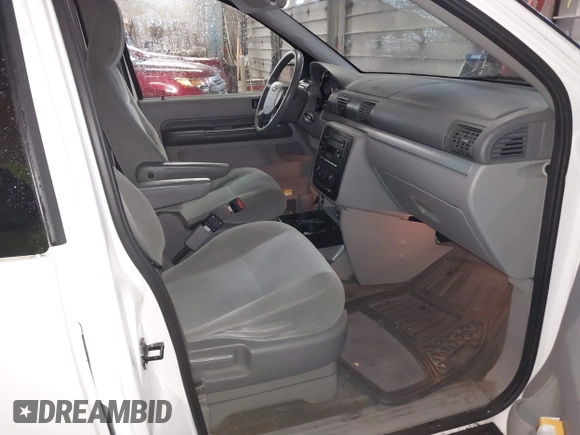 2005 Ford Freestar SES с VIN 2FMZA57695BA87443, выставлен на аукционе IAAI как лот 40873184 с пробегом 144 558 миль миль и . История ставок и продаж доступна на DreamBid. Изображение 5.