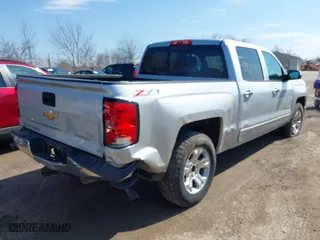2015 Chevrolet Silverado 1500 LT with VIN 3GCUKREC0FG316716, listed as a IAAI auction lot 41908921 with 242,093 mi miles. Bid and sale history available at carsss.com. Image 6.
