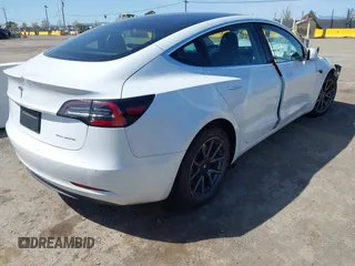 2020 Tesla Model 3 Long Range with VIN 5YJ3E1EB4LF619754, listed as a IAAI auction lot 41920422 with 82,430 mi miles and . Bid and sale history available at DreamBid. Image 4.