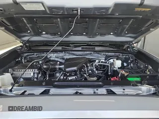 2019 Toyota Tacoma SR with VIN 5TFRX5GN1KX143485, listed as a IAAI auction lot 42763045 with 90,847 mi miles and . Bid and sale history available at DreamBid. Image 2.