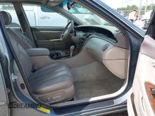 2001 Toyota Avalon XL z VIN 4T1BF28B01U138040, wystawiony jako IAAI lot #42320480 z przebiegiem 220 086 mil mil oraz . Historia ofert i sprzedaży dostępna na DreamBid. Obrazek 5.