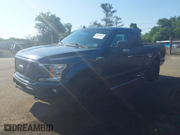 2018 Ford F-150 XL with VIN 1FTFX1EG0JFB07498, listed as a IAAI auction lot 42550647 with 126,637 mi miles and . Bid and sale history available at DreamBid. Image 16.