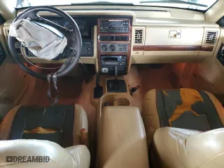 1995 Jeep Grand Cherokee Limited with VIN 1J4GZ78Y2SC723898, listed as a Copart auction lot 54142035 with 173,454 mi miles and Salvage Title. Bid and sale history available at carsss.com. Image 8.