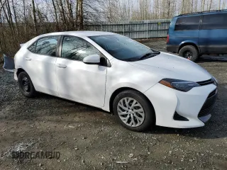 2019 Toyota Corolla L with VIN 2T1BURHE2KC203496, listed as a Copart auction lot 49132655 with 122,309 mi miles and Salvage Title. Bid and sale history available at DreamBid. Image 4.