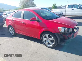 2015 Chevrolet Sonic LTZ with VIN 1G1JE5SB7F4202054, listed as a IAAI auction lot 42174396 with 148,029 mi miles and . Bid and sale history available at DreamBid. Image 1.