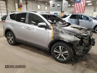 2018 Toyota RAV4 XLE with VIN JTMRFREV2JD234942, listed as a Copart auction lot 54136645 with Not Provided miles and Salvage Title. Bid and sale history available at DreamBid. Image 4.