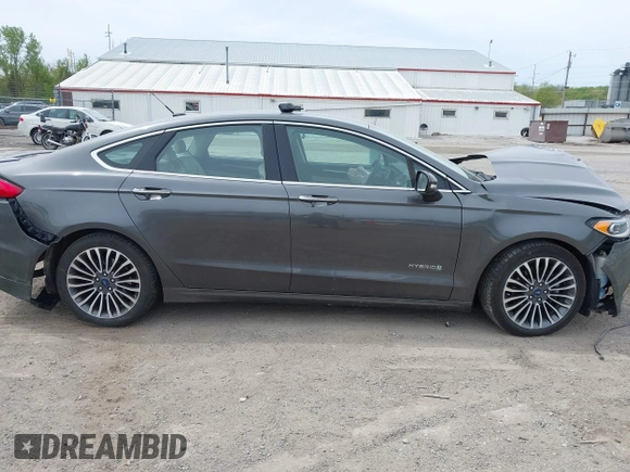 2018 Ford Fusion Titanium with VIN 3FA6P0RU1JR120392, listed as a IAAI auction lot 42145342 with Not provided miles and . Bid and sale history available at DreamBid. Image 13.