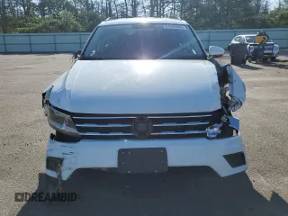 2020 Volkswagen Tiguan S with VIN 3VV1B7AX0LM037667, listed as a Copart auction lot 61649485 with 71,557 mi miles and Salvage title. Bid and sale history available at DreamBid. Image 5.