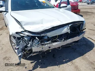 2015 BMW 5 Series 528i xDrive with VIN WBA5A7C54FG143565, listed as a IAAI auction lot 41948957 with 107,255 mi miles and . Bid and sale history available at carsss.com. Image 6.