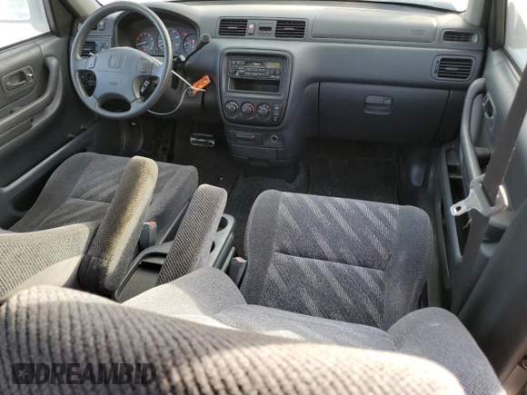 1999 Honda CR-V LX with VIN JHLRD2844XC016583, listed as a Copart auction lot 73747274 with 104,730 mi miles and Salvage Title. Bid and sale history available at carsss.com. Image 8.