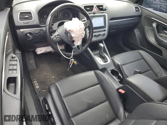 2013 Volkswagen Eos Komfort with VIN WVWBW8AH4DV001851, listed as a Copart auction lot 52132944 with 81,948 mi miles and Salvage Title. Bid and sale history available at DreamBid. Image 8.