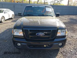 2011 Ford Ranger XLT with VIN 1FTLR4FE9BPB07796, listed as a IAAI auction lot 42128597 with 235,512 mi miles. Bid and sale history available at carsss.com. Image 13.