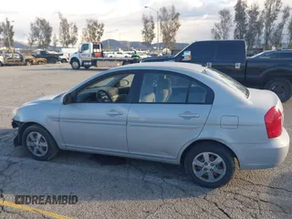 2006 Hyundai Accent GLS with VIN KMHCN46C86U007833, listed as a IAAI auction lot 41760603 with 60,030 mi miles. Bid and sale history available at carsss.com. Image 14.