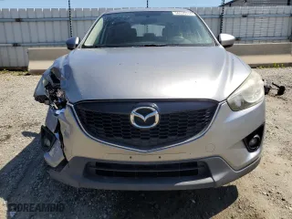 2014 Mazda CX-5 Touring with VIN JM3KE4CY9E0415402, listed as a Copart auction lot 56576114 with 181,719 mi miles and Salvage Title. Bid and sale history available at carsss.com. Image 5.