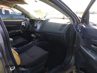 2019 Mitsubishi Outlander Sport SE 2.0 with VIN JA4AP4AUXKU005513, listed as a IAAI auction lot 41353888 with 144,070 mi miles. Bid and sale history available at carsss.com. Image 5.
