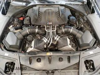 2013 BMW M5 z VIN WBSFV9C5XDC772672, wystawiony jako Copart lot #53732175 z przebiegiem 83 665 mil mil oraz Tytuł czysty. Historia ofert i sprzedaży dostępna na DreamBid. Obrazek 11.