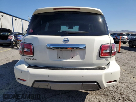 2019 Nissan Armada SL z VIN JN8AY2NDXK9087199, wystawiony jako Copart lot #56715045 z przebiegiem 56 930 mil mil oraz Szkoda całkowita • Salvage title. Historia ofert i sprzedaży dostępna na DreamBid. Obrazek 6.