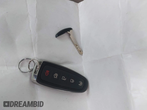 2018 Ford Escape Titanium with VIN 1FMCU9J90JUD53380, listed as a IAAI auction lot 42042802 with 30,371 mi miles and . Bid and sale history available at DreamBid. Image 11.