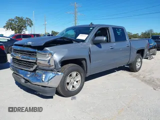 2016 Chevrolet Silverado 1500 LT with VIN 3GCUKREC8GG219524, listed as a IAAI auction lot 41087657 with 123,010 mi miles and . Bid and sale history available at DreamBid. Image 17.