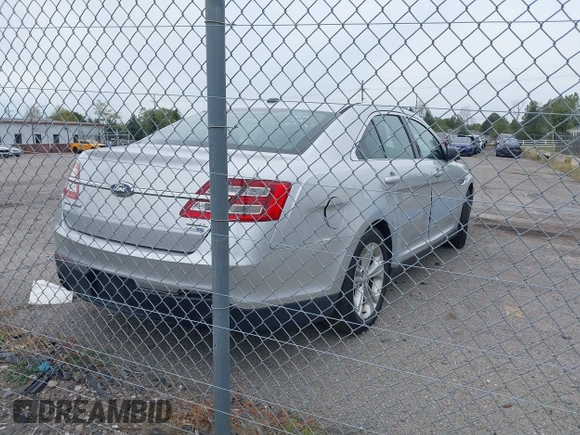 2013 Ford Taurus SEL with VIN 1FAHP2H87DG191746, listed as a IAAI auction lot 40445448 with 231,634 mi miles and . Bid and sale history available at DreamBid. Image 4.