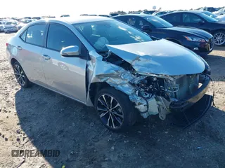 2019 Toyota Corolla L z VIN 5YFBURHE5KP912424, wystawiony jako IAAI lot #41214138 z przebiegiem 105 242 mil mil oraz . Historia ofert i sprzedaży dostępna na DreamBid. Obrazek 1.