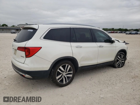 2017 Honda Pilot Touring with VIN 5FNYF5H95HB015365, listed as a Copart auction lot 52371205 with 153,141 mi miles and Salvage title. Bid and sale history available at DreamBid. Image 3.