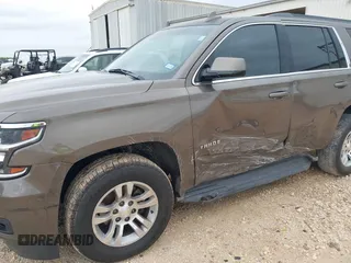 2015 Chevrolet Tahoe LT z VIN 1GNSCBKC2FR685780, wystawiony jako IAAI lot #42354130 z przebiegiem 101 617 mil mil oraz . Historia ofert i sprzedaży dostępna na DreamBid. Obrazek 6.