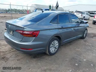 2019 Volkswagen Jetta S with VIN 3VWC57BU1KM219974, listed as a IAAI auction lot 41510105 with 153,989 mi miles. Bid and sale history available at carsss.com. Image 4.
