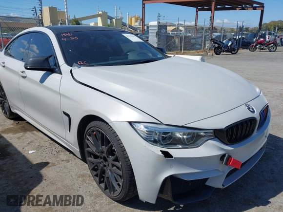 2015 BMW 4 Series 428i xDrive with VIN WBA4C9C54FD330582, listed as a IAAI auction lot 42135691 with 127,289 mi miles and . Bid and sale history available at DreamBid. Image 18.