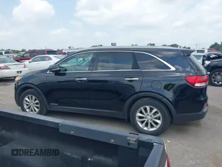 2016 Kia Sorento LX z VIN 5XYPGDA50GG112670, wystawiony jako IAAI lot #42170870 z przebiegiem 165 053 mil mil oraz . Historia ofert i sprzedaży dostępna na DreamBid. Obrazek 14.