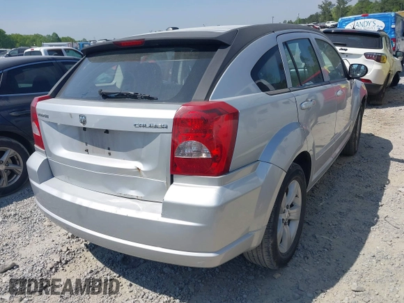 2011 Dodge Caliber Mainstreet with VIN 1B3CB3HAXBD107494, listed as a IAAI auction lot 42071328 with 146,936 mi miles. Bid and sale history available at carsss.com. Image 4.