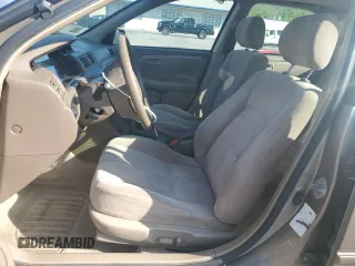 1999 Toyota Camry LE z VIN JT2BG22K0X0295893, wystawiony jako Copart lot #56183655 z przebiegiem 327 172 mil mil oraz Szkoda całkowita • Salvage title. Historia ofert i sprzedaży dostępna na DreamBid. Obrazek 7.
