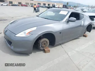 2012 Nissan 370Z Touring with VIN JN1AZ4EH4CM561415, listed as a IAAI auction lot 41838948 with 111,298 mi miles. Bid and sale history available at carsss.com. Image 18.