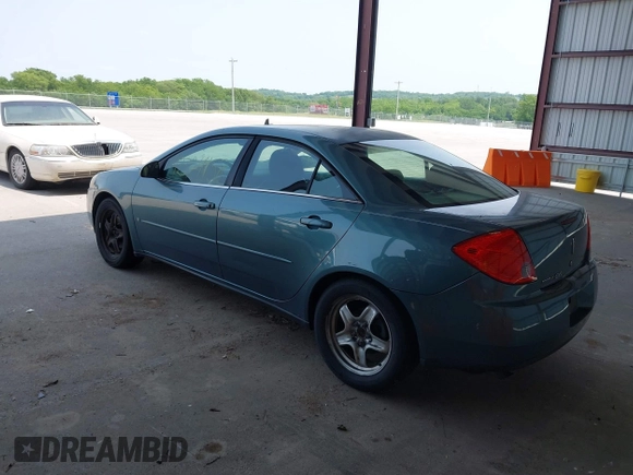 2009 Pontiac G6 1SA with VIN 1G2ZG57B694157985, listed as a IAAI auction lot 42374458 with 202,323 mi miles and . Bid and sale history available at DreamBid. Image 3.