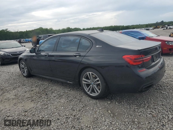 2018 BMW 7 Series 740e xDrive with VIN WBA7J2C59JB246238, listed as a Copart auction lot 53777335 with 76,642 mi miles and Salvage Title. Bid and sale history available at carsss.com. Image 2.