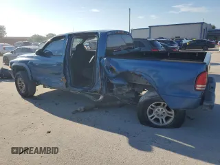 2004 Dodge Dakota Sport with VIN 1D7HG38N14S770031, listed as a Copart auction lot 72001434 with 131,547 mi miles and Salvage Title. Bid and sale history available at DreamBid. Image 2.