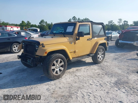 2013 Jeep Wrangler Arctic z VIN 1C4GJWBG2DL634942, wystawiony jako IAAI lot #42373239 z przebiegiem 131 470 mil mil oraz . Historia ofert i sprzedaży dostępna na DreamBid. Obrazek 2.