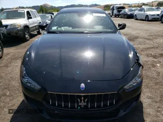 2018 Maserati Ghibli with VIN ZAM57XSA4J1293201, listed as a Copart auction lot 56165633 with 32,481 mi miles. Bid and sale history available at carsss.com. Image 5.