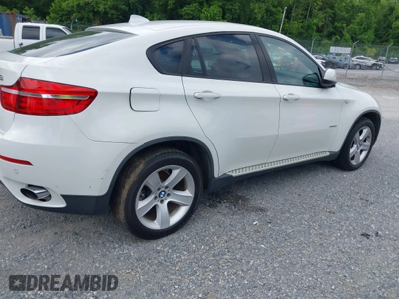 2013 BMW X6 xDrive35i z VIN 5UXFG2C59DL788319, wystawiony jako IAAI lot #42522879 z przebiegiem 158 589 mil mil oraz . Historia ofert i sprzedaży dostępna na DreamBid. Obrazek 4.