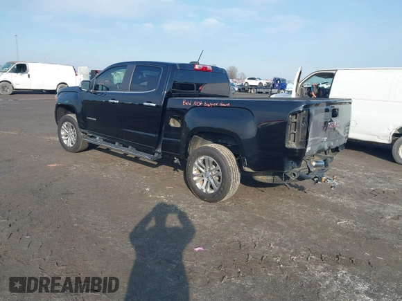 2015 GMC Canyon 4WD SLT with VIN 1GTG6CE34F1153369, listed as a IAAI auction lot 41277810 with 135,821 mi miles. Bid and sale history available at carsss.com. Image 3.